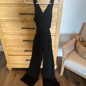 Entro Black Jumpsuit Sleek Design Versatile Fit